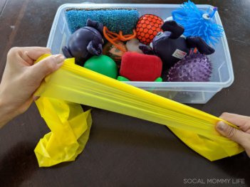 sensory box for toddler to improve dexterity
